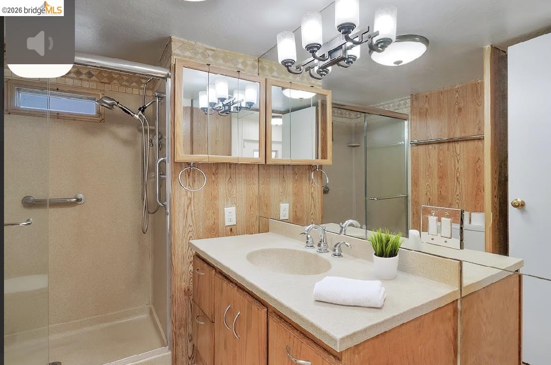 64 Oneida Street Oakley, CA 94561 - Photo 4 of 18 a bathroom with a sink vanity granite shower and a mirror