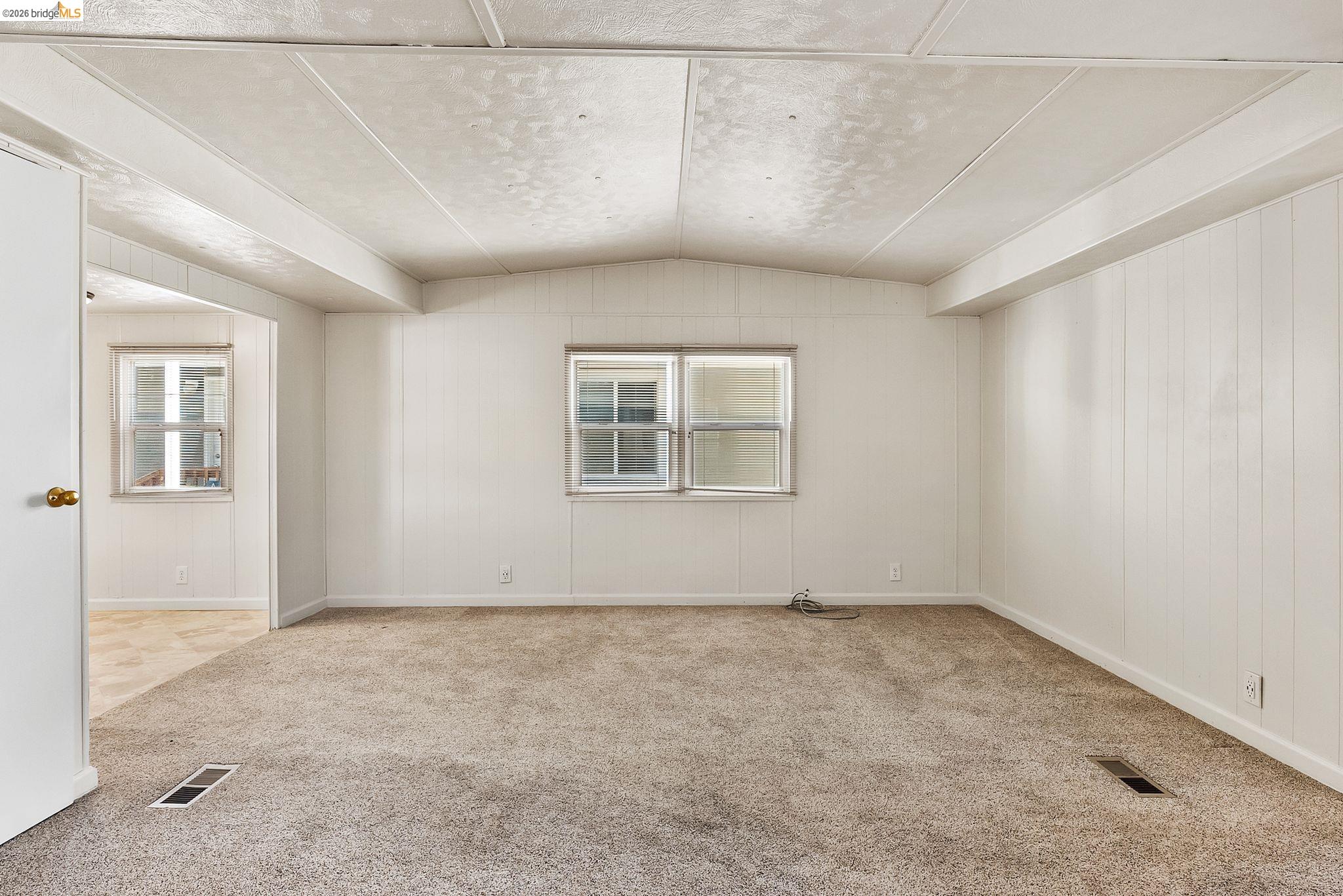 64 Oneida Street Oakley, CA 94561 - Photo 9 of 18 an empty room with windows