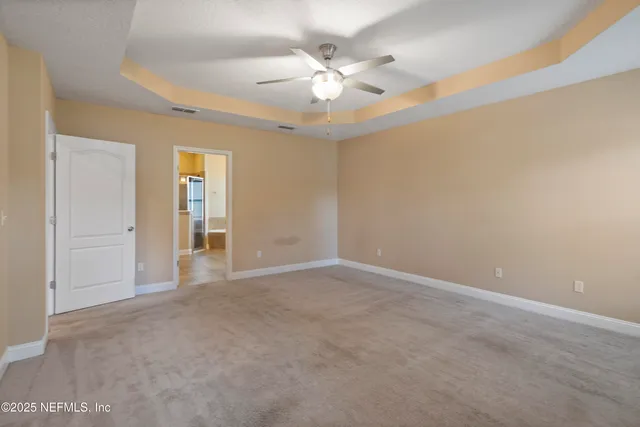 a view of a patio with couches chairs and a yard