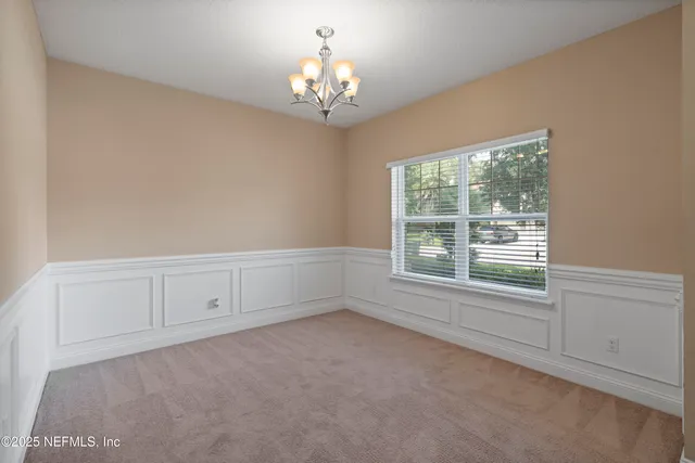 a view of livingroom with furniture and stairs