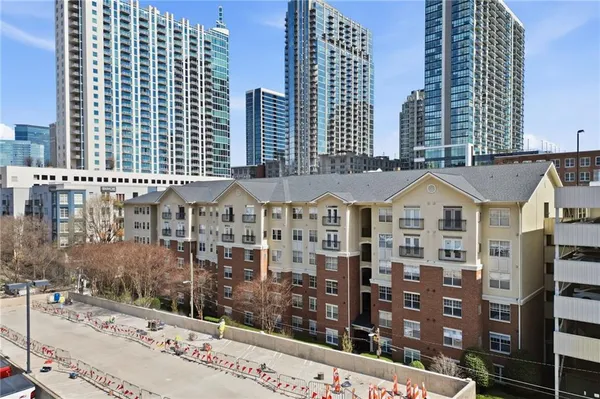 a view of a city with tall buildings