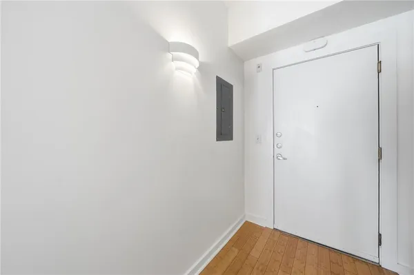 a kitchen with granite countertop a sink and cabinets