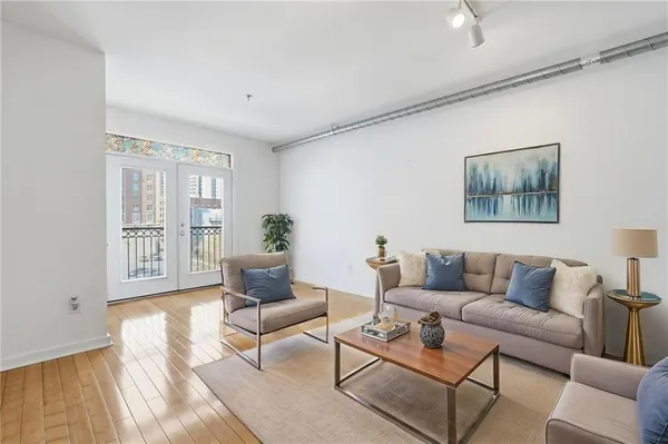 a kitchen with a refrigerator and a stove