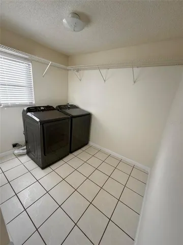 a bathroom with a granite countertop sink a mirror and a vanity