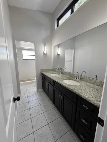 a view of a room with a projector and a fan