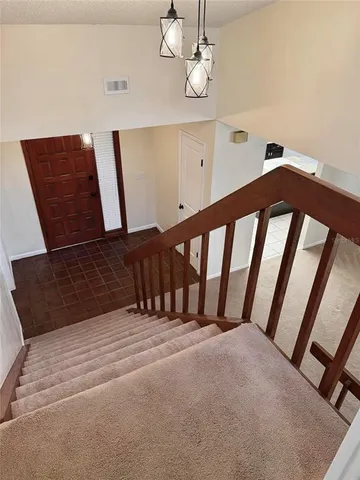 a view of wooden floor and staircase