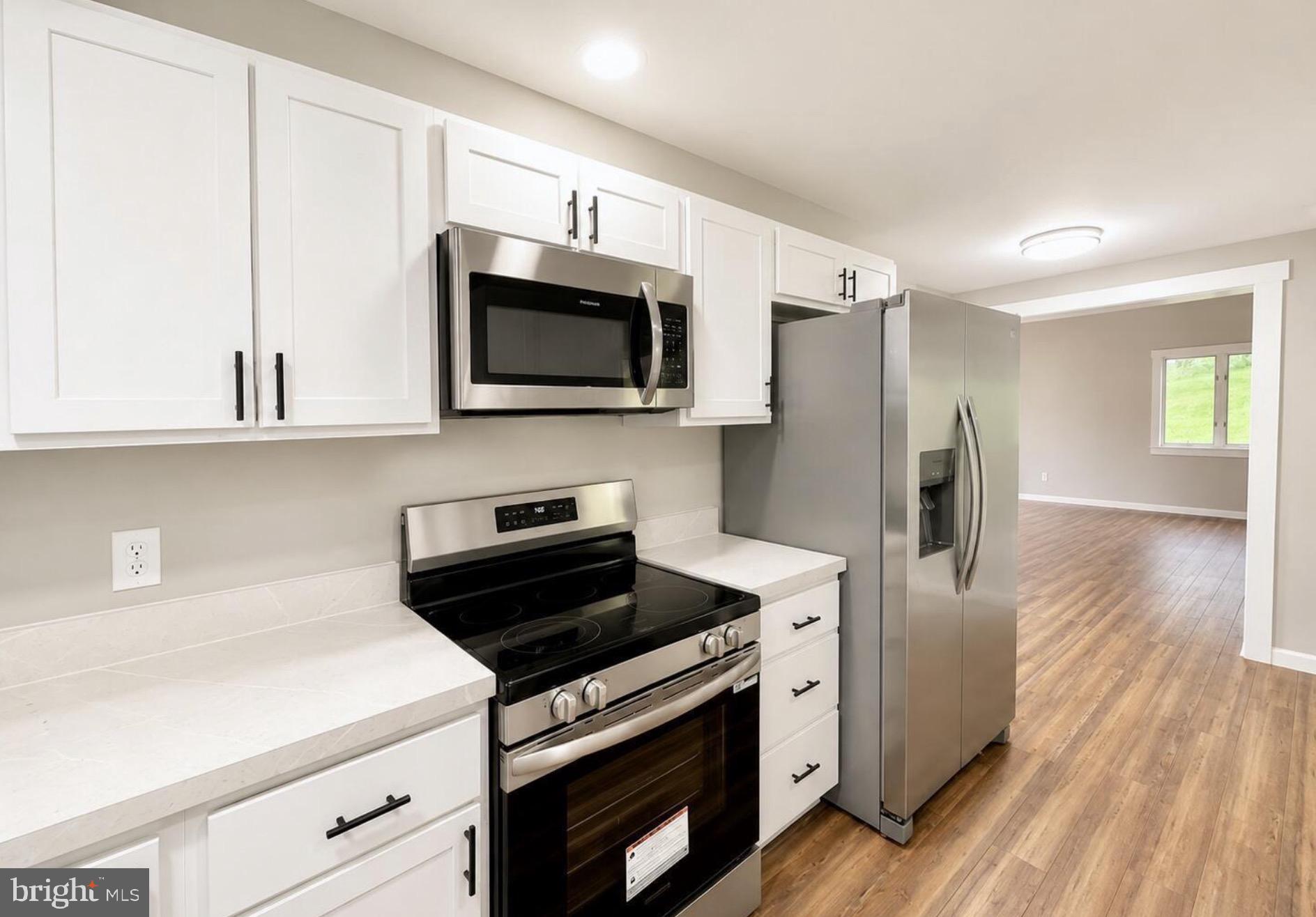 4805 Buffalo Run Road Port Matilda, PA 16870 - Photo 6 of 29 Modern kitchen with sleek finishes.