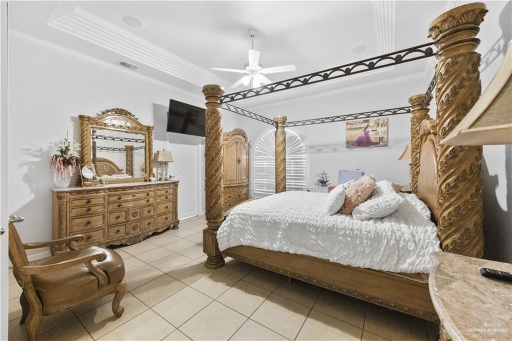 800 East Mile 3 Road Mission, TX 78573 - Photo 17 of 45 a bedroom with a bed dresser and window