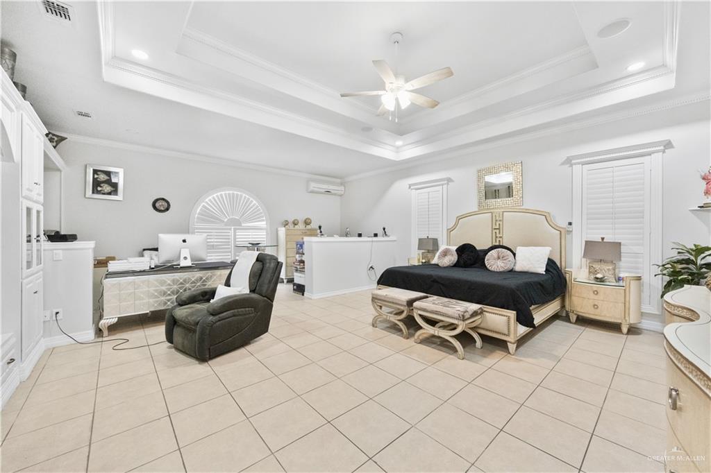 800 East Mile 3 Road Mission, TX 78573 - Photo 26 of 45 a living room with furniture and a chandelier