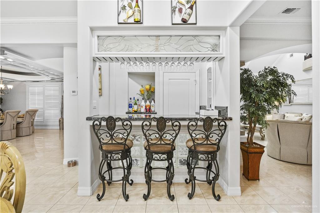 800 East Mile 3 Road Mission, TX 78573 - Photo 27 of 45 a view of a dining area with furniture