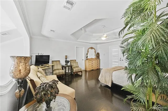 a bedroom with furniture and window