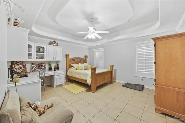 a bathroom with a granite countertop sink a toilet a mirror and shower