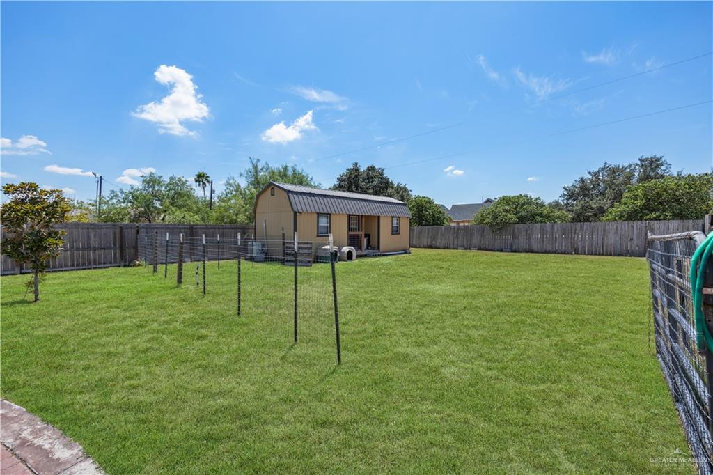 800 East Mile 3 Road Mission, TX 78573 - Photo 42 of 45 a house view with a garden space