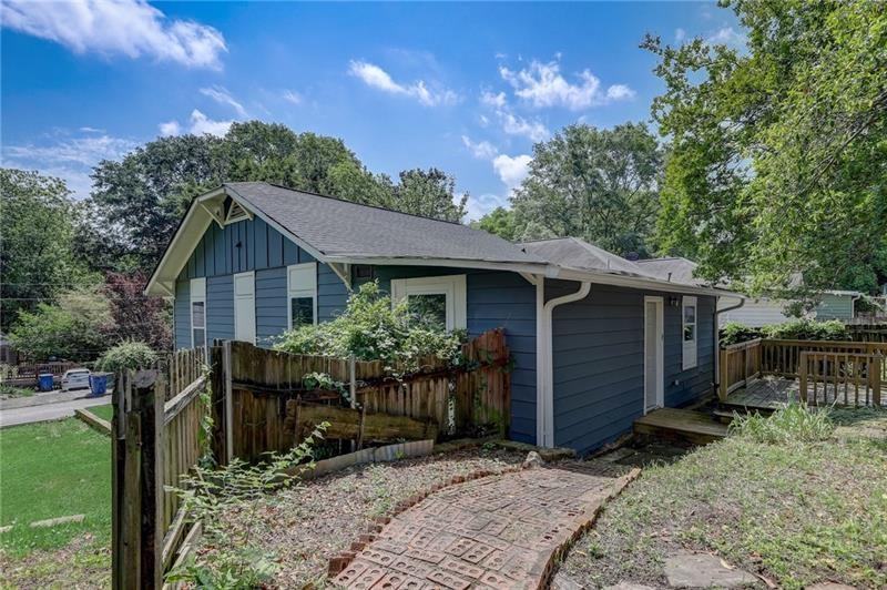 807 Gilbert Street Southeast Atlanta, GA 30316 - Photo 18 of 23 a front view of house with yard and trees in the background