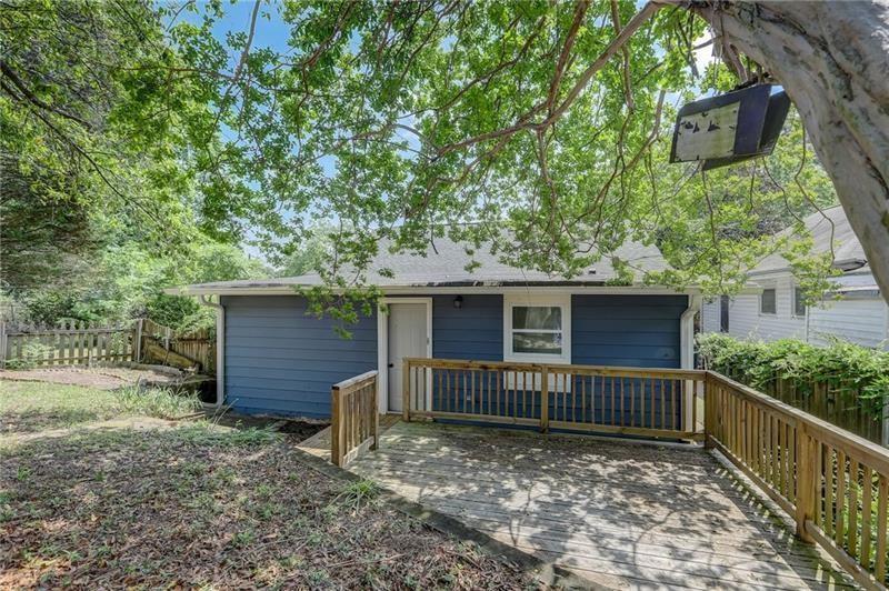 807 Gilbert Street Southeast Atlanta, GA 30316 - Photo 22 of 23 a view of a house with a small yard and wooden fence