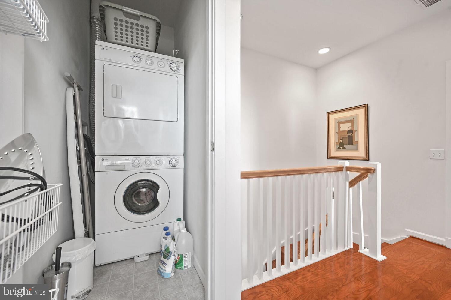 343 Cedar Street Northwest, Unit 322 Washington, DC 20012 - Photo 33 of 40 a view of a hallway with washer and dryer