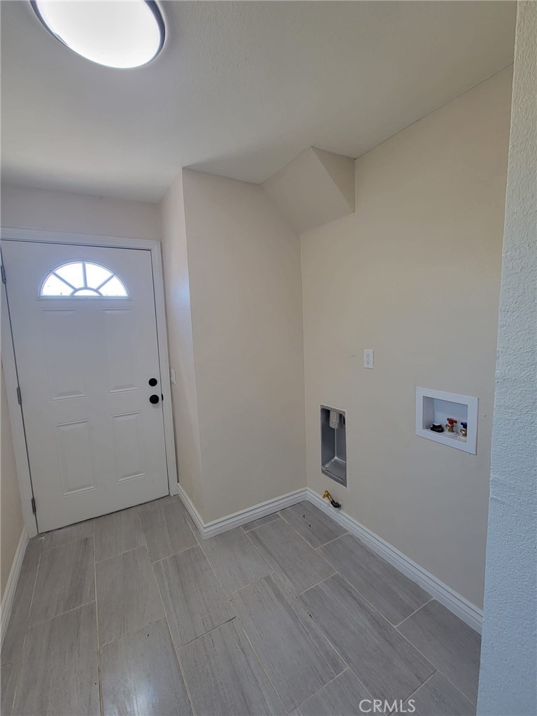 140 North 4th Street Colton, CA 92324 - Photo 19 of 22 a view of a livingroom with wooden floor