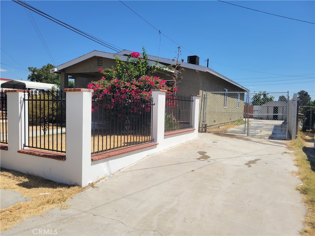 140 North 4th Street Colton, CA 92324 - Photo 3 of 22 a front view of a house with a porch