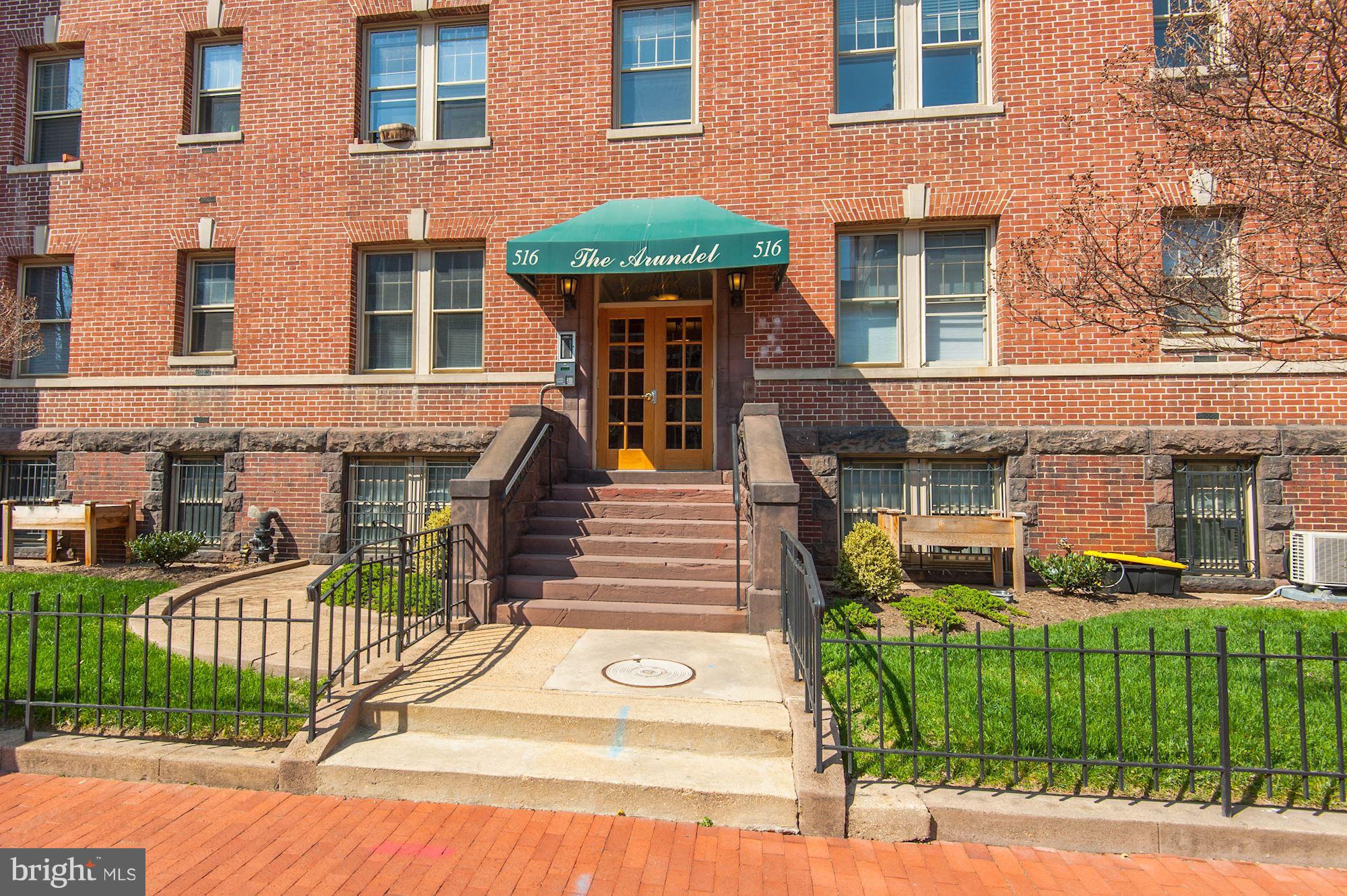 516 A Street Northeast, Unit 205 Washington, DC 20002 - Photo 21 of 21 a front view of a house with a garden