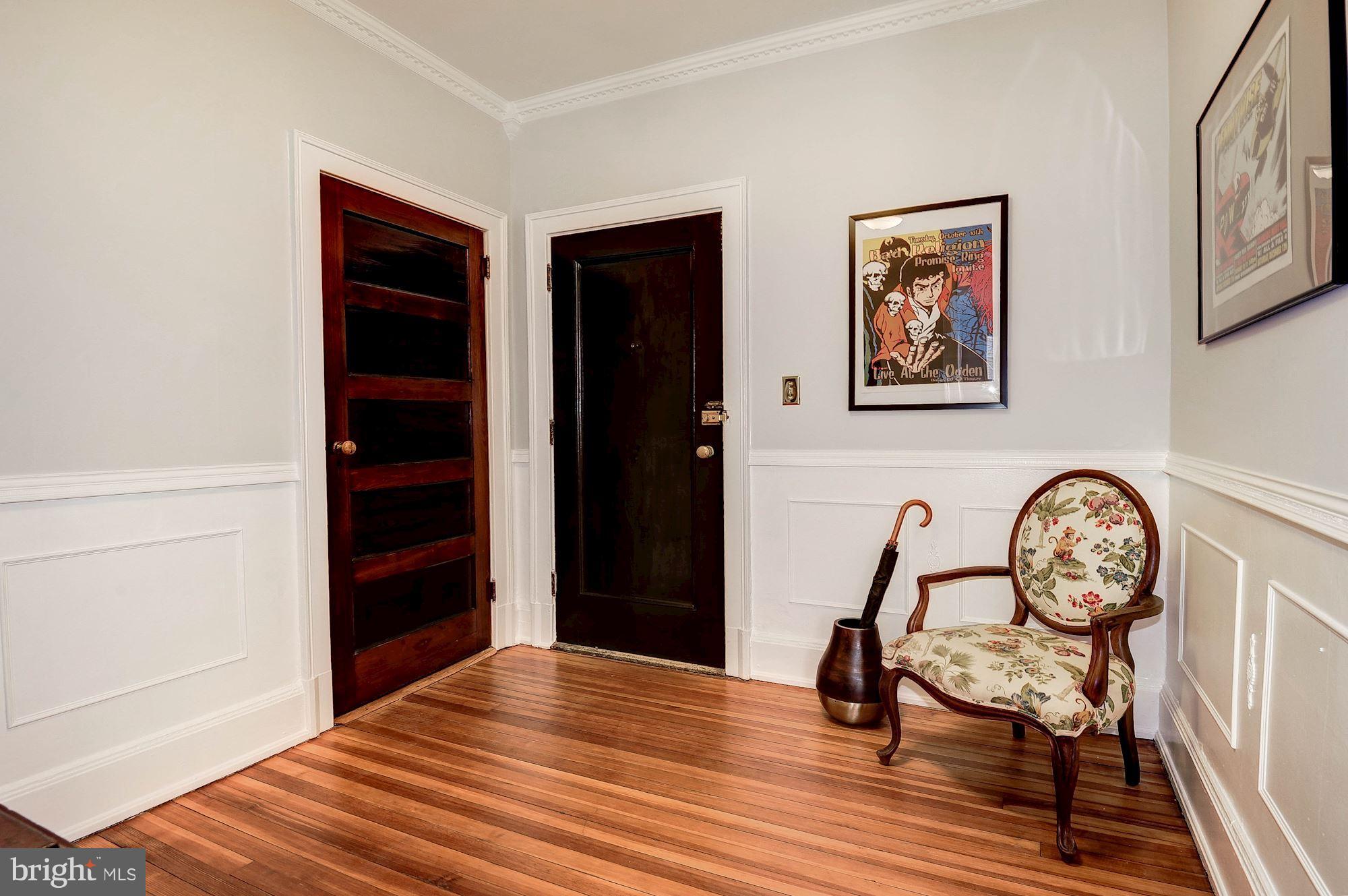 516 A Street Northeast, Unit 205 Washington, DC 20002 - Photo 6 of 21 a view of a hallway with wooden floor and workspace