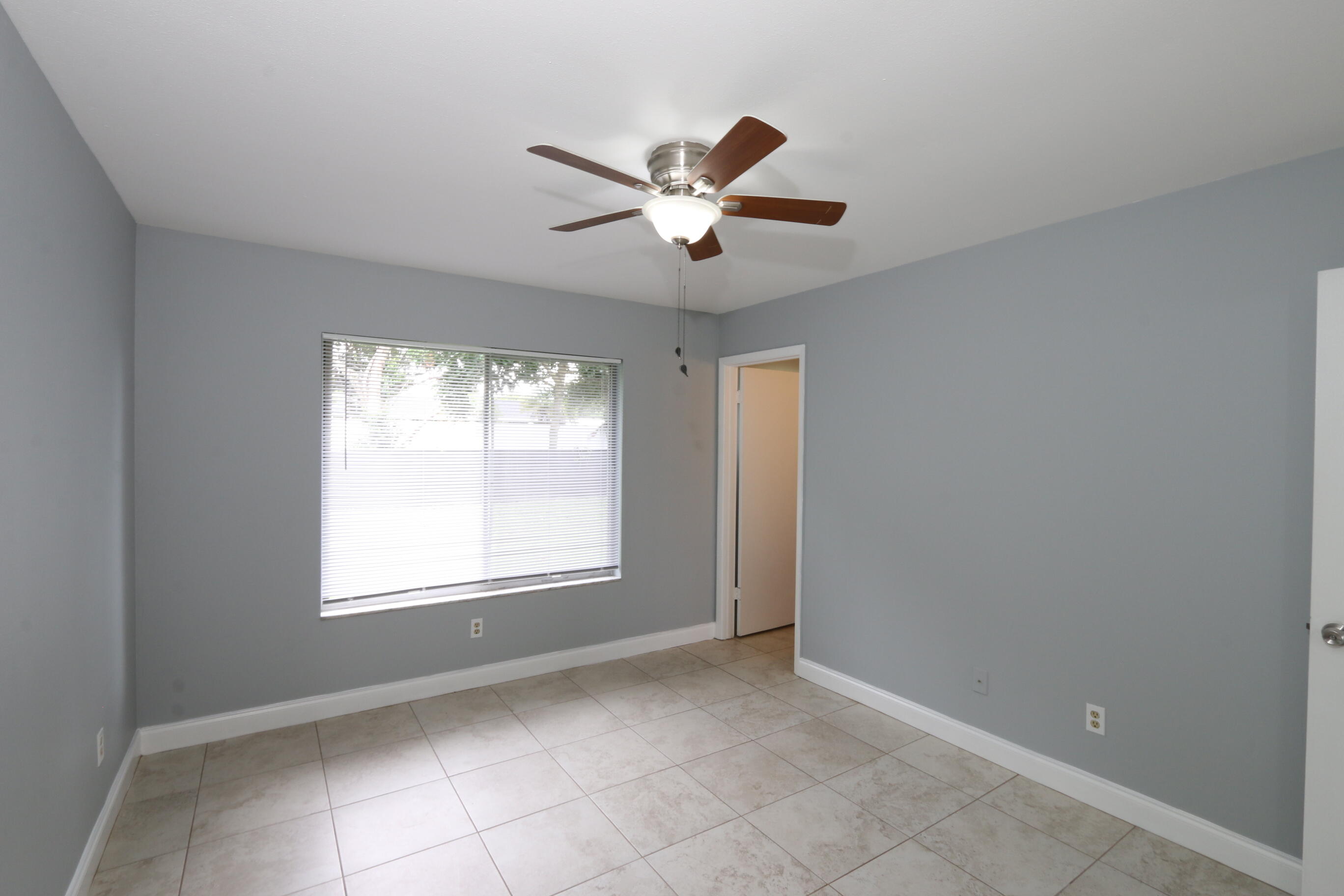 400 Southwest Ruffner Court Port St. Lucie, FL 34953 - Photo 17 of 27 Primary Bedroom