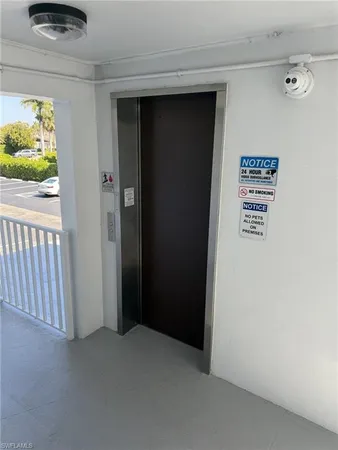 a bathroom with a sink and a window