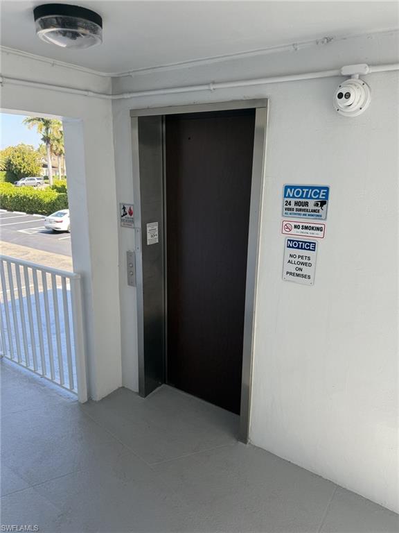 72 7th Street South, Unit 108 Naples, FL 34102 - Photo 13 of 22 a view of a hallway with a hallway