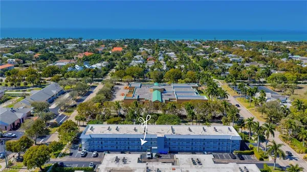 an aerial view of residential house with parking space