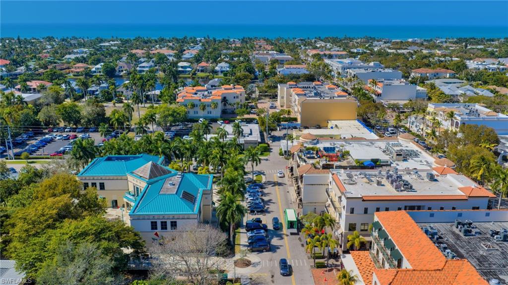 72 7th Street South, Unit 108 Naples, FL 34102 - Photo 9 of 22 an aerial view of multiple house