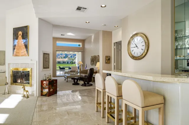 a spacious bathroom with a large tub and a large mirror
