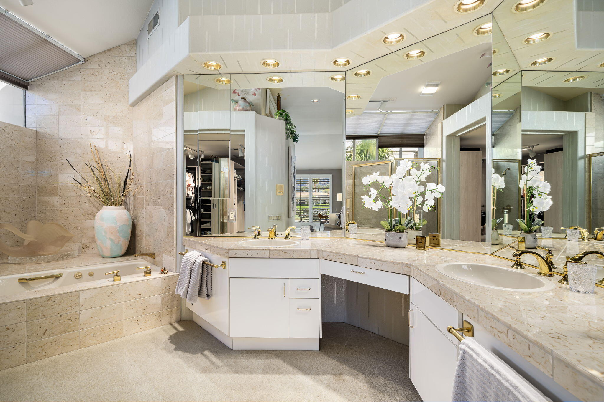 75315 St Andrews Court Indian Wells, CA 92210 - Photo 29 of 48 a bathroom with a granite countertop sink mirror and
