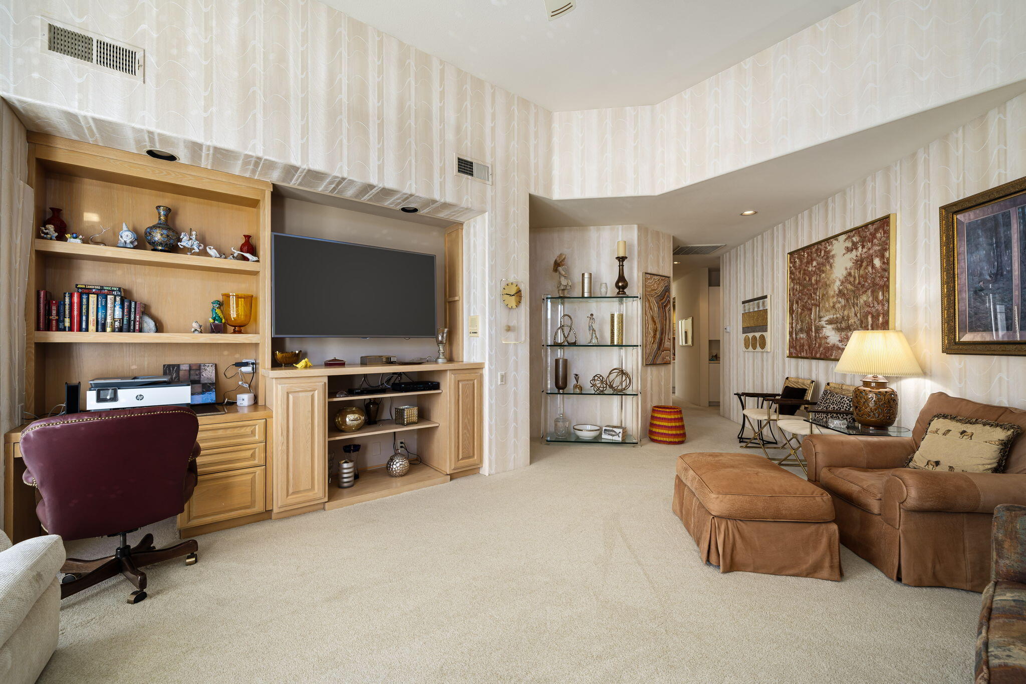 75315 St Andrews Court Indian Wells, CA 92210 - Photo 32 of 48 a living room with furniture and a flat screen tv
