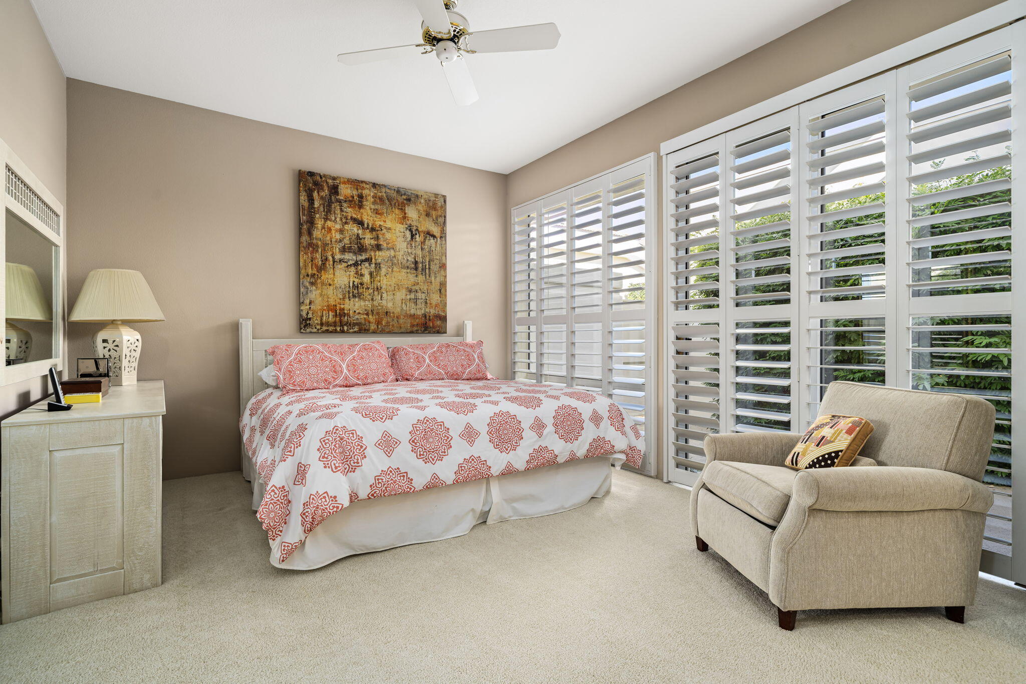 75315 St Andrews Court Indian Wells, CA 92210 - Photo 35 of 48 a bedroom with a bed and a couch