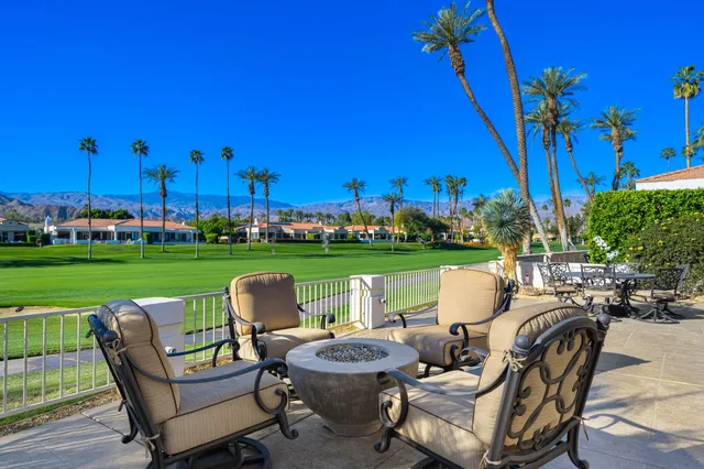 a view of a patio with chair and table