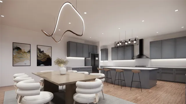 a living room with furniture kitchen view and a chandelier