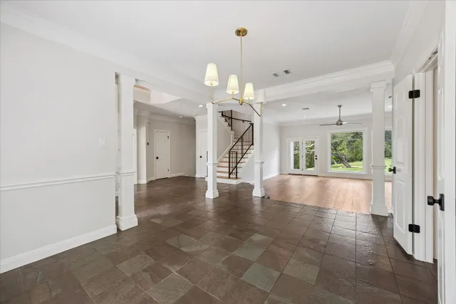 a view of livingroom with hardwood floor and a ceiling fan