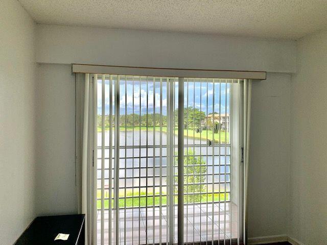 117 Brighton C Boca Raton, FL 33434 - Photo 10 of 23 Second Bedroom