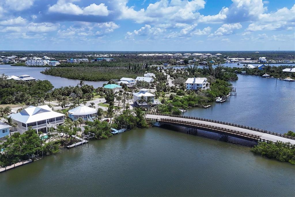 71 North Gulf Boulevard Placida, FL 33946 - Photo 16 of 52 an aerial view of a house with a lake view