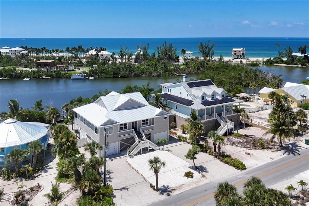 71 North Gulf Boulevard Placida, FL 33946 - Photo 3 of 52 an aerial view of a house with a lake view