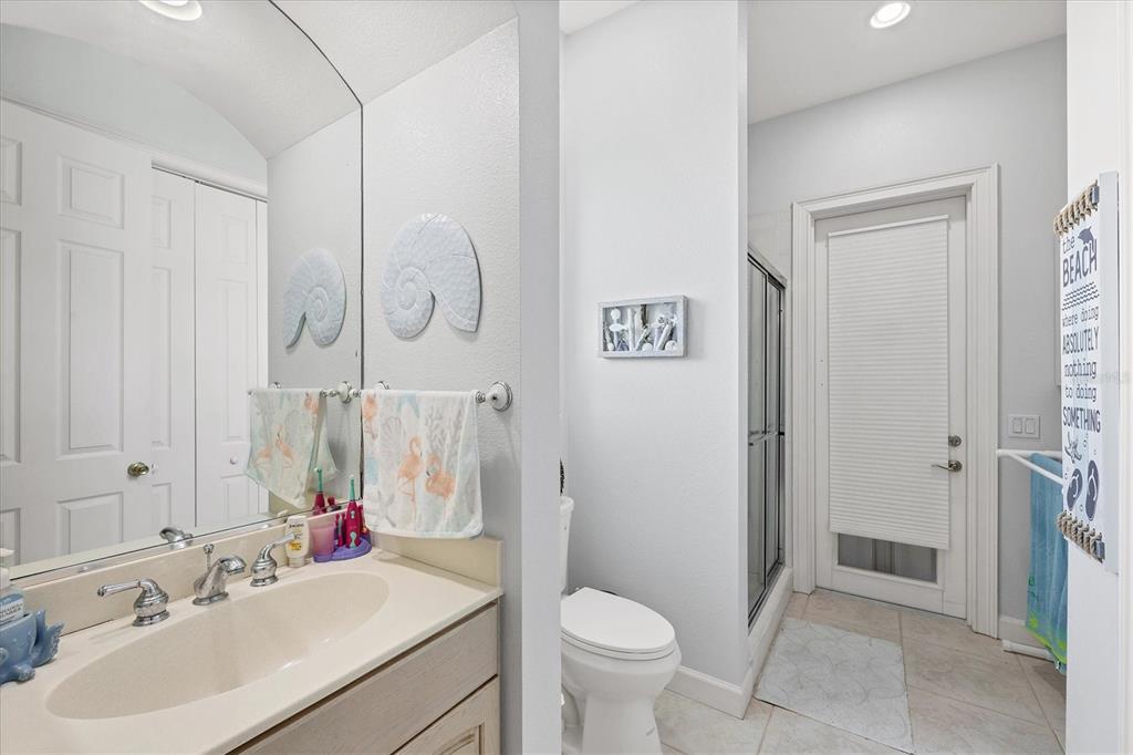 71 North Gulf Boulevard Placida, FL 33946 - Photo 32 of 52 a bathroom with a sink toilet and shower