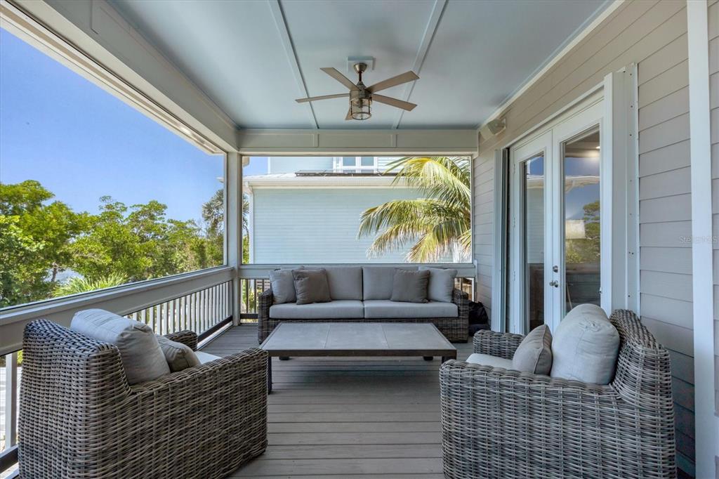 71 North Gulf Boulevard Placida, FL 33946 - Photo 34 of 52 a living room with furniture and a large window