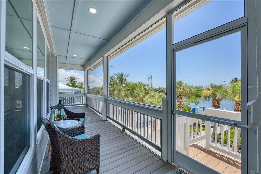 71 North Gulf Boulevard Placida, FL 33946 - Photo 35 of 52 a view of a balcony with chairs