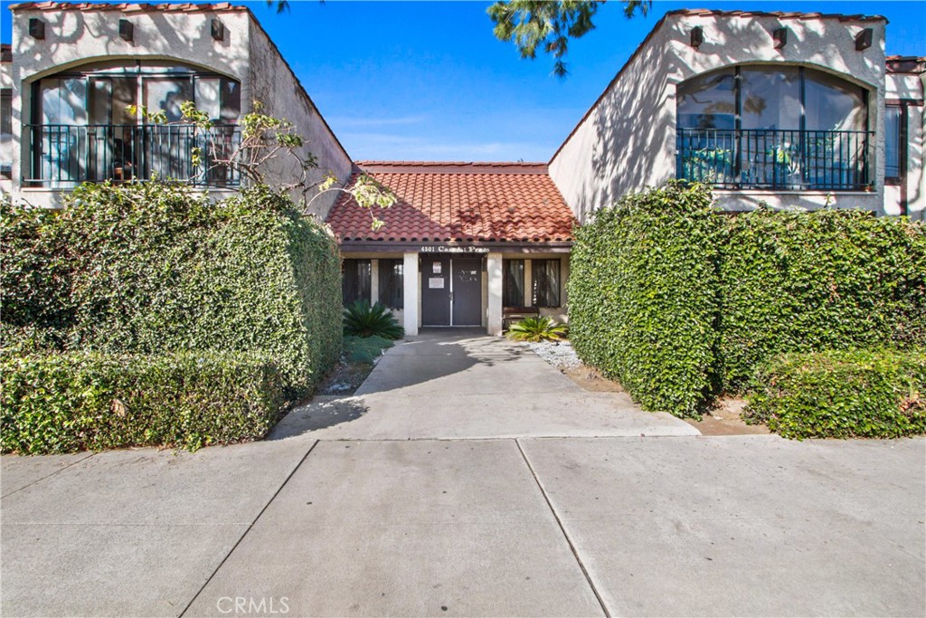 4501 Peck Road, Unit 23 El Monte, CA 91732 - Photo 1 of 12 a front view of a house with a yard