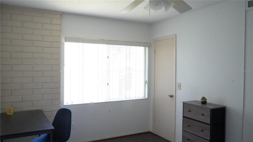 1700 Southwest 16th Court, Unit J4 Gainesville, FL 32608 - Photo 14 of 21 a view of a window in a room