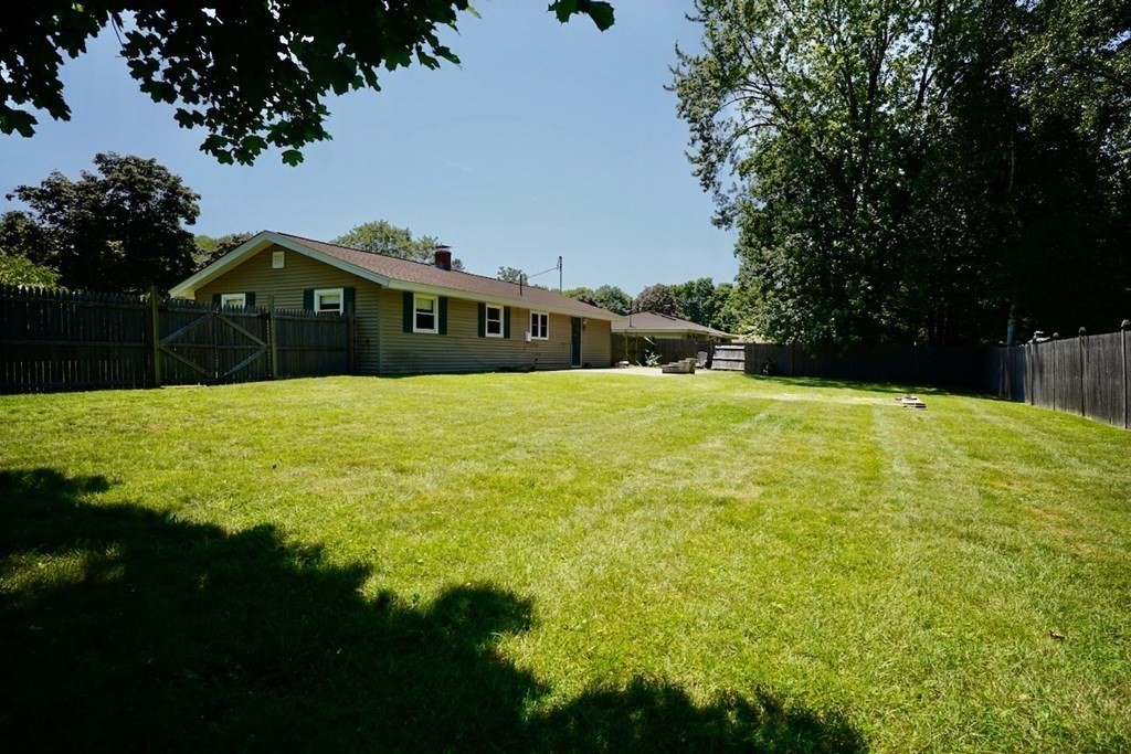 8 Dondi Road Beverly, MA 01915 - Photo 1 of 29 a white house with a large pool