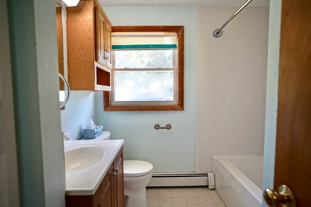 8 Dondi Road Beverly, MA 01915 - Photo 20 of 29 a bathroom with a sink toilet and tub