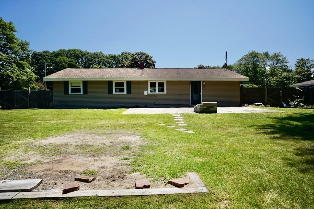 8 Dondi Road Beverly, MA 01915 - Photo 26 of 29 a front view of house with yard and trees