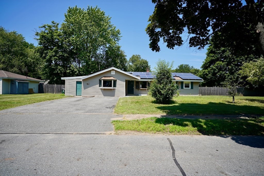 8 Dondi Road Beverly, MA 01915 - Photo 3 of 29 a front view of house with yard and green space