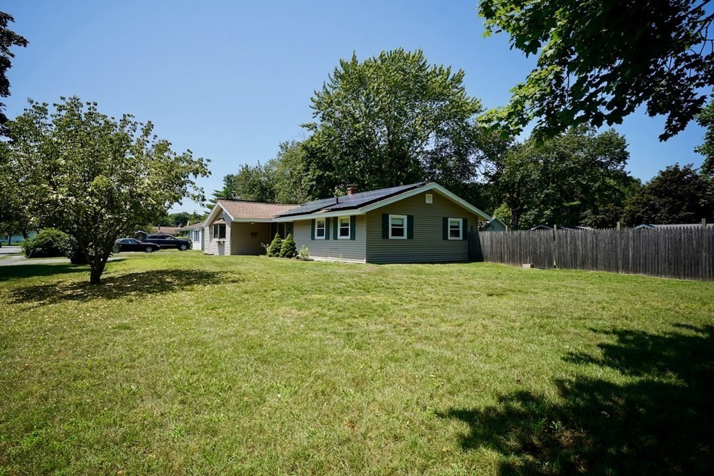 8 Dondi Road Beverly, MA 01915 - Photo 4 of 29 a house view with a garden