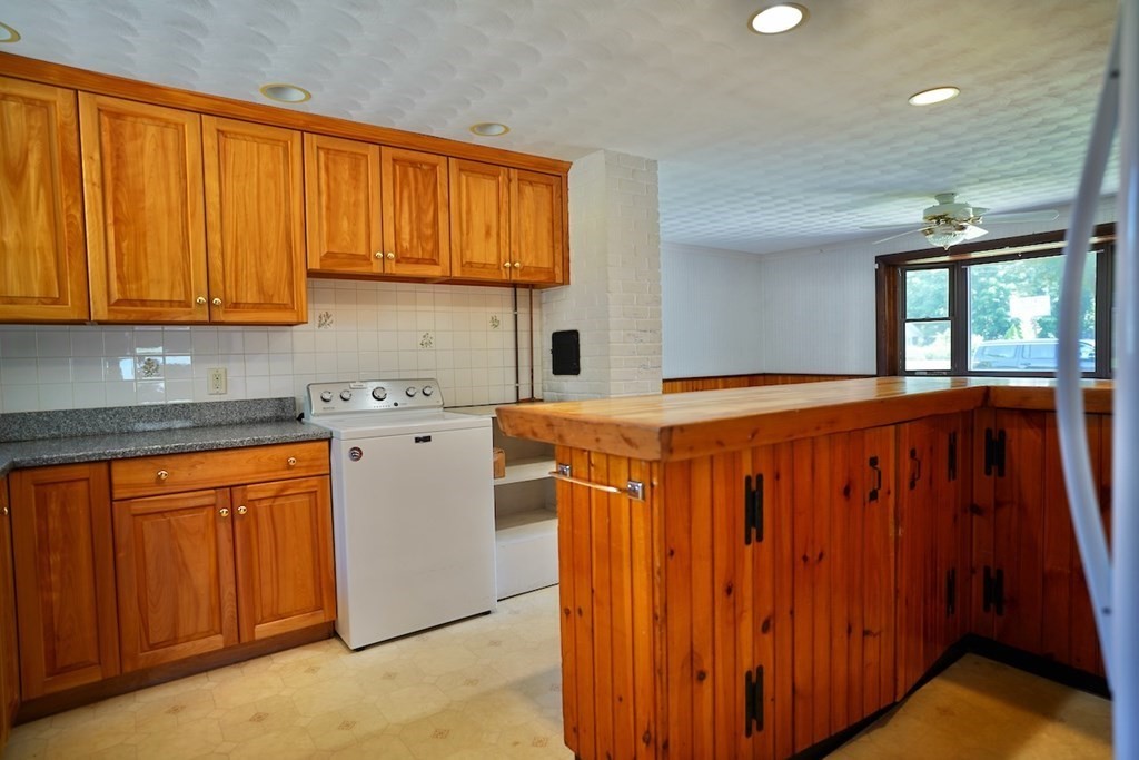 8 Dondi Road Beverly, MA 01915 - Photo 7 of 29 a view of a kitchen with wooden floor